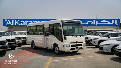 Toyota Coaster DLX - 23 Seater Bus with 4.2L Diesel Engine - Manual Transmission - AM/FM - Power Door