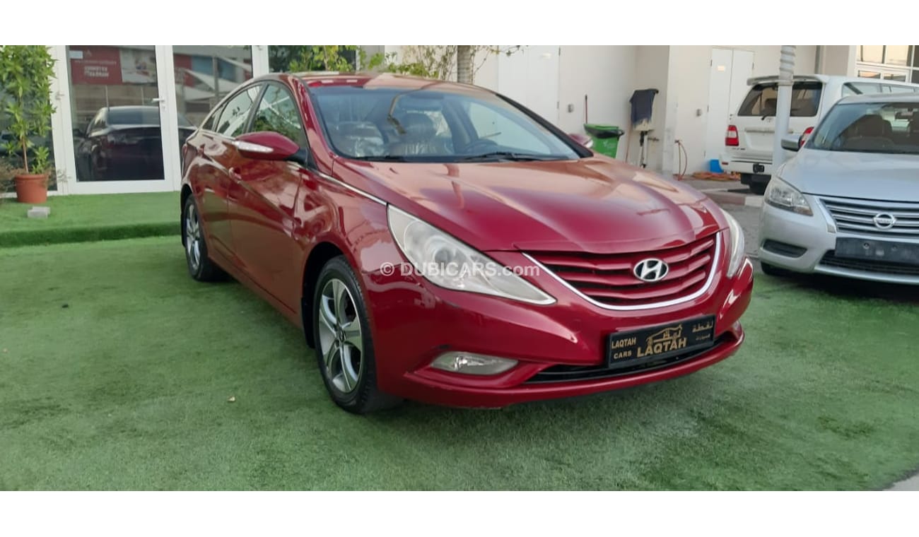 هيونداي سوناتا خليجى -2013 رنجات - مشغل اقراص - نوافذ كهربائية لون أحمر داخل رصاصى بحالة ممتازة لاتحتاج لاى مصاريف