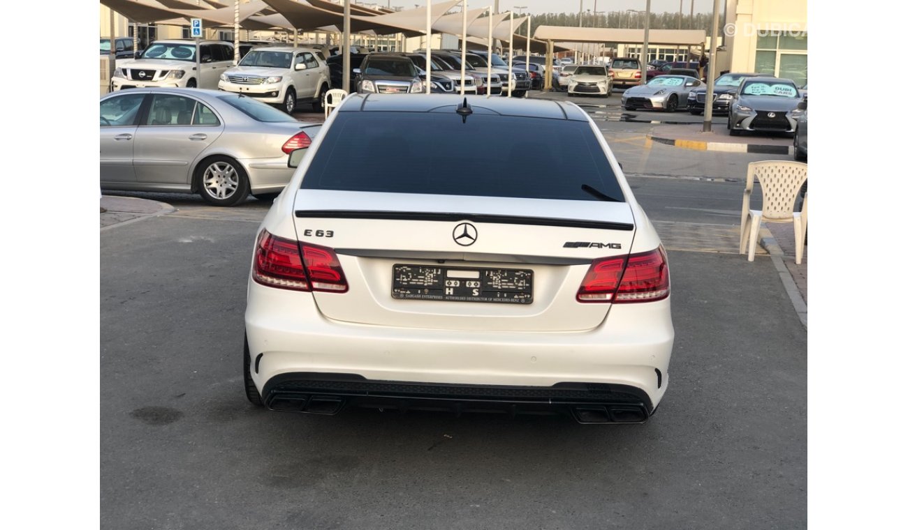 مرسيدس بنز E 63 AMG موديل 2014 حاله ممتازه من الداخل والخارج فل مواصفات كراسي جلد وبانوراما وتحكم كهربي كامل ونظام صوت م