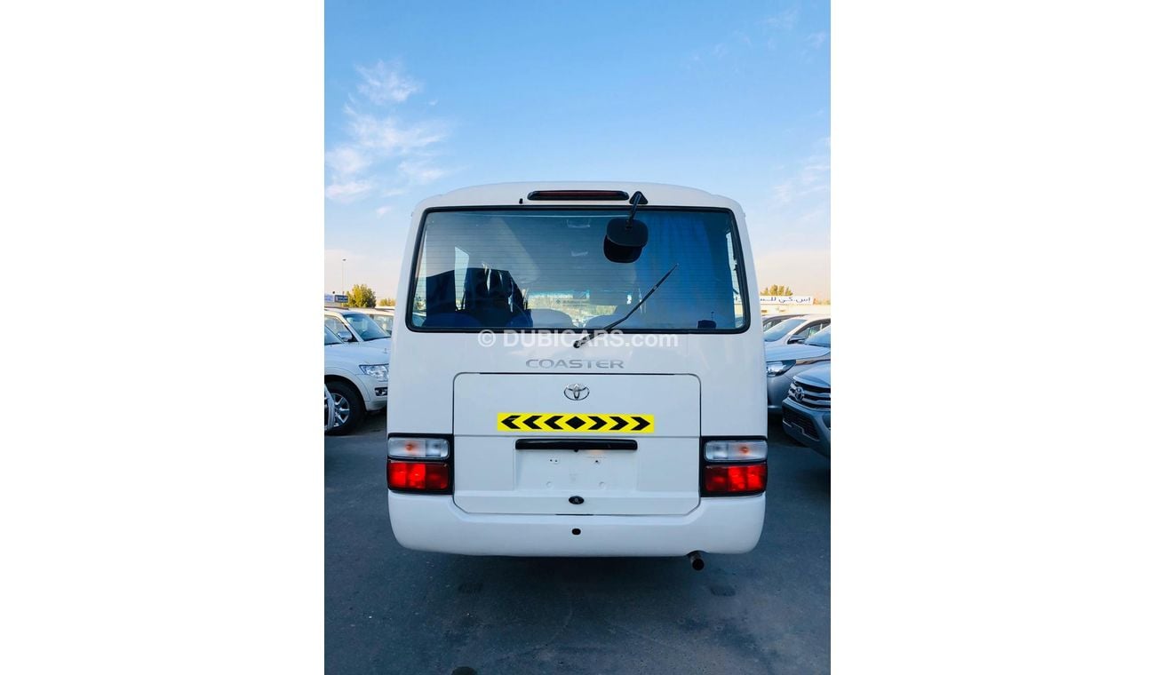 Toyota Coaster 30 SEATER------4.2L-DIESEL------LIKE BRAND NEW-DVD-REAR CAMERA-----ESPECIALMENTE PARA ANGOLA