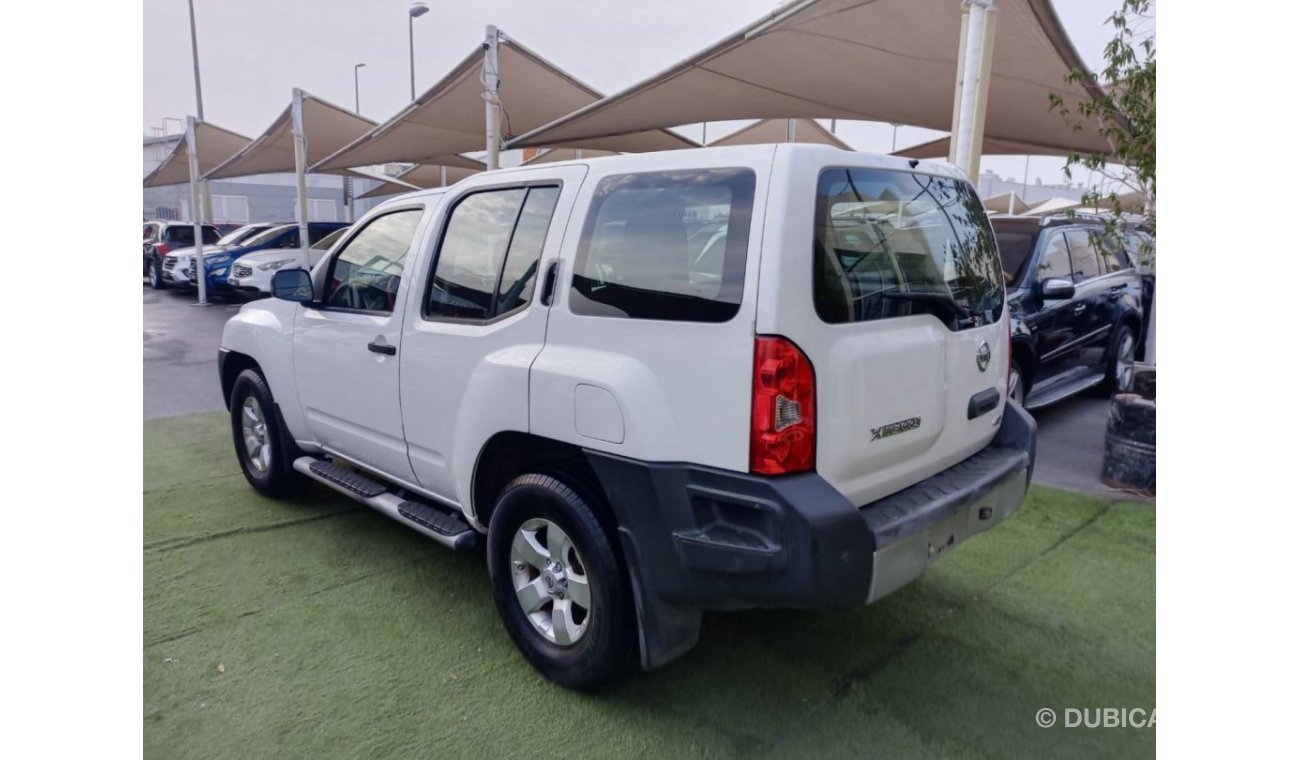 Nissan X-Terra Gulf model 2012 Forel wheels, rear camera screen, in excellent condition