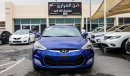 Hyundai Veloster Pre-owned for sale in Sharjah. Blue 2015 model, available at Wael Al Azzazi Sharjah