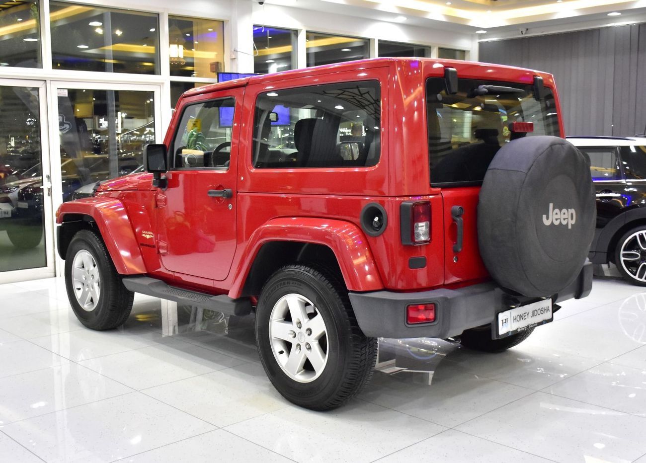 Jeep Wrangler EXCELLENT DEAL for our Jeep Wrangler Sahara ( 2014 Model ) in Red Color GCC Specs