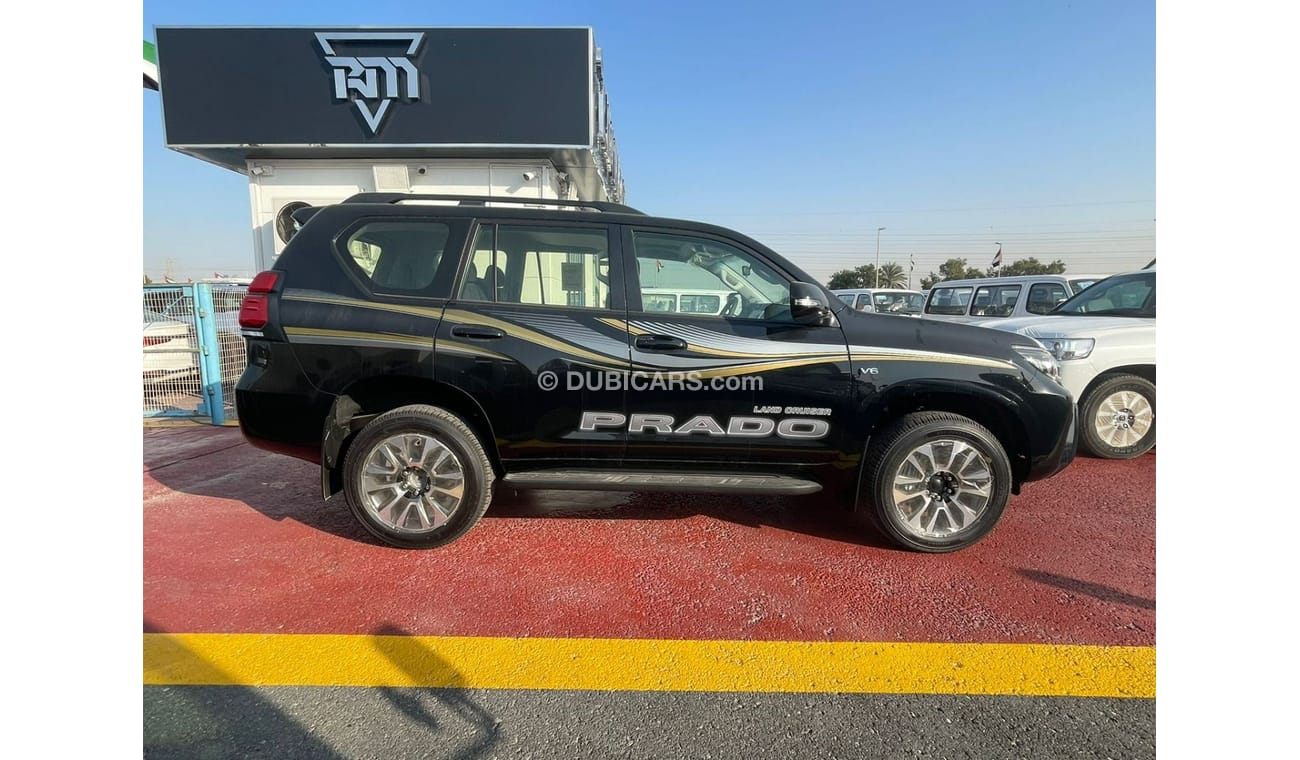 تويوتا برادو تويوتا برادو TXL 4.0L V6 بفتحة سقف لون اسود موديل 2022