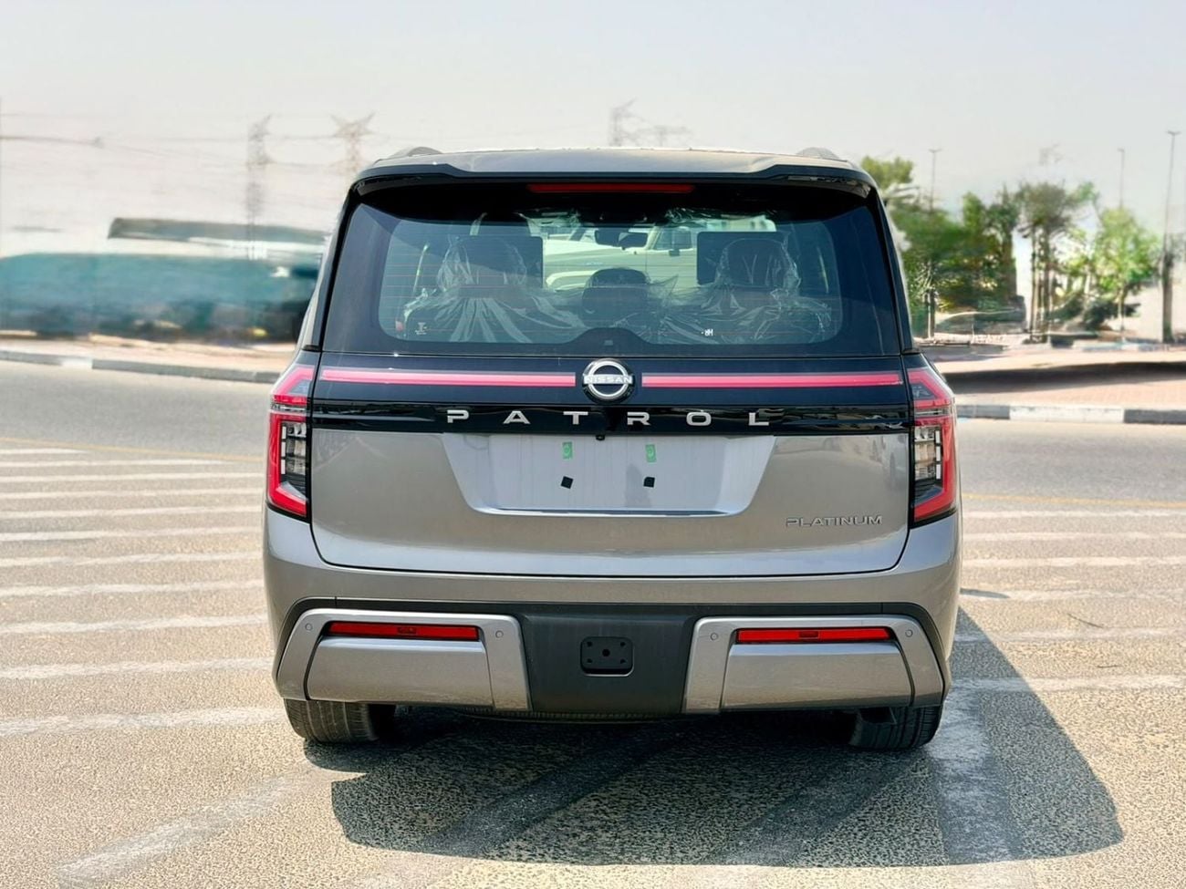 Nissan Patrol LE PLATINUM CITY 2026 NISSAN PATROL 3.5T Platinum - Grey / Red