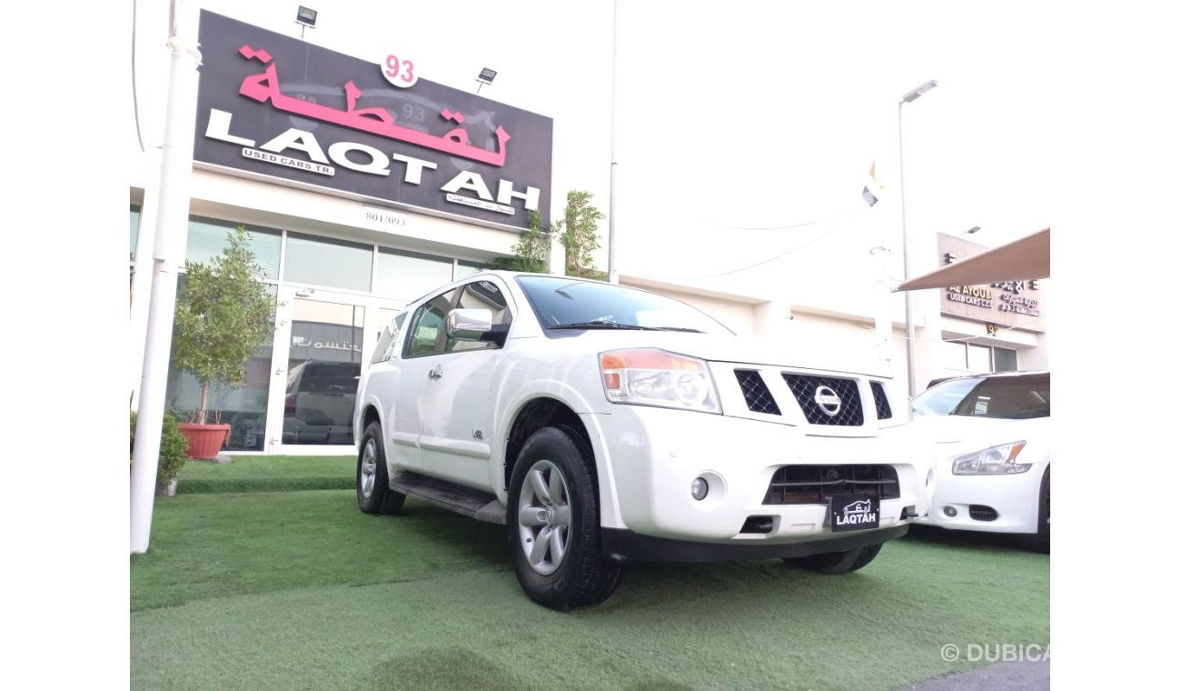 Nissan Armada Gulf model 2009  SE paint agency number one slot control unit in excellent condition