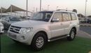 ميتسوبيشي باجيرو 2013 ابيض  خليجى بحالة ممتاذة ماشى قليل