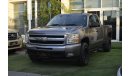 Chevrolet Silverado Pickup model 2009 imported silver color, equipped with two side halves, tyote wheels, sensors cruise