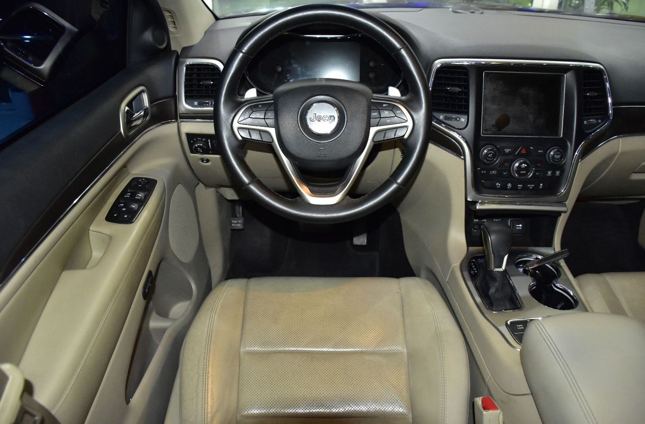 Jeep Grand Cherokee EXCELLENT DEAL for our Jeep Grand Cherokee Limited 4x4 ( 2017 Model ) in Red Color GCC Specs