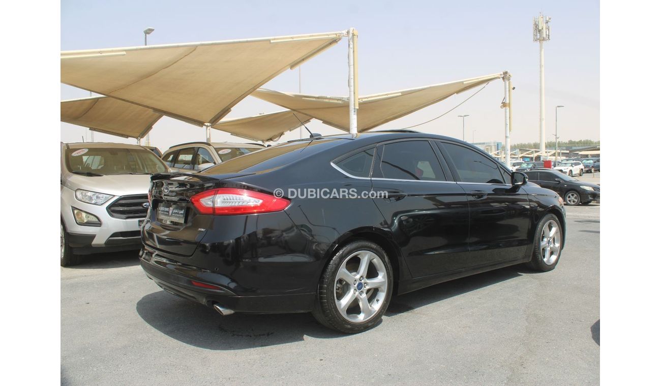 Ford Fusion SEL ACCIDENTS FREE- ORIGINAL PAINT - GCC - SUNROOF - CAR IS IN PERFECT CONDITION INSIDE OUT - GCC