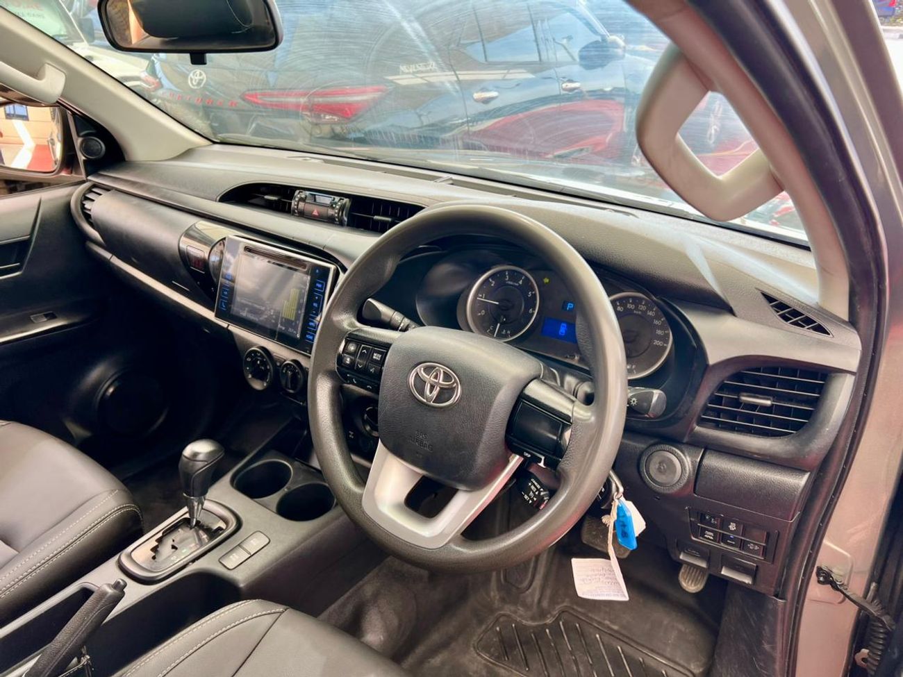 تويوتا هيلوكس The Toyota Hilux is a legendary, mid-size pickup truck known for its exceptional ruggedness, durabil