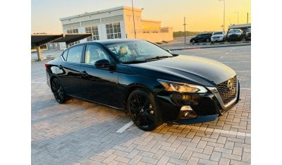 Nissan Altima SR with Sunroof and Custom VCC Papers