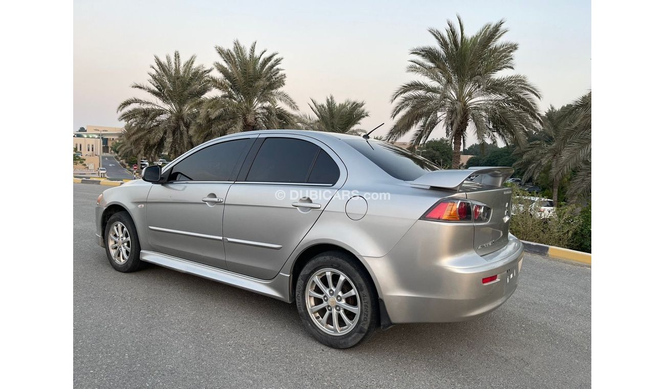 Mitsubishi Lancer MITSUBISHI LANCER 2,0 - GLS- mobile 2014 Excellent Conditio  Very celen car Full automatic Free acci