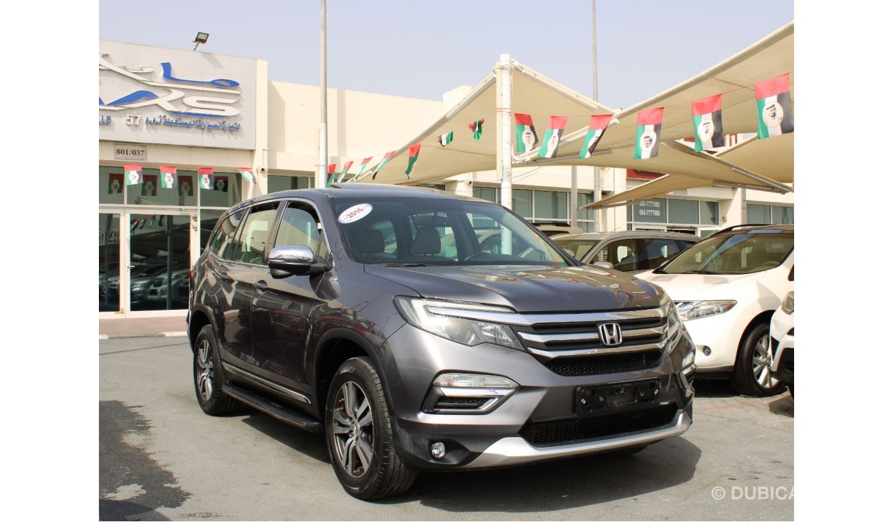 Honda Pilot Touring FULL OPTION  - GCC - EXCELLENT CONDITION INSIDE OUT - ACCIDENTS FREE