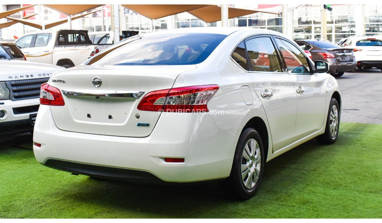 Nissan Sentra GCC, 2016 model, without accidents, white color, beige leather interior, Android screen, rear camera