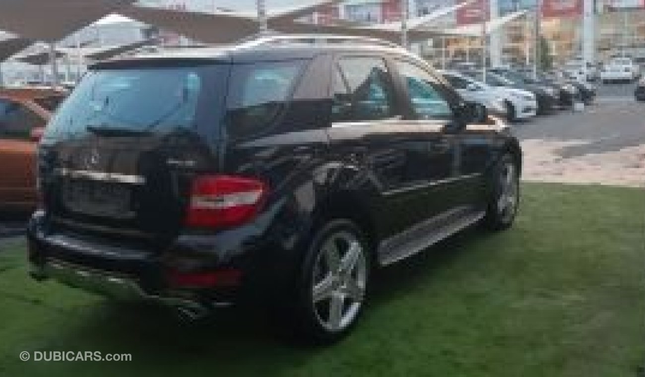 مرسيدس بنز ML 350 خليجى رقم واحد فتحة جلد رنجات حساسات خشب بصمة مثبت سرعة جناح خلفى