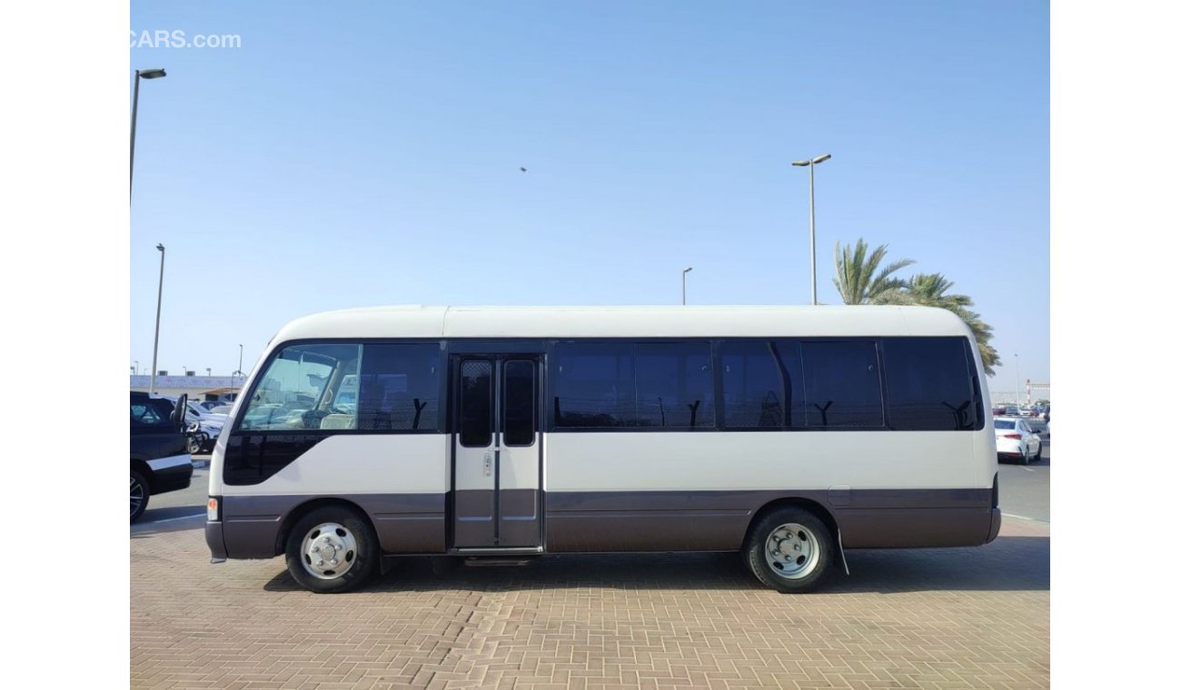 Toyota Coaster HZB50-0106438--TOYOTA	COASTER	1998	WHITE-CC 4200-DIESEL RHD Only For Export.