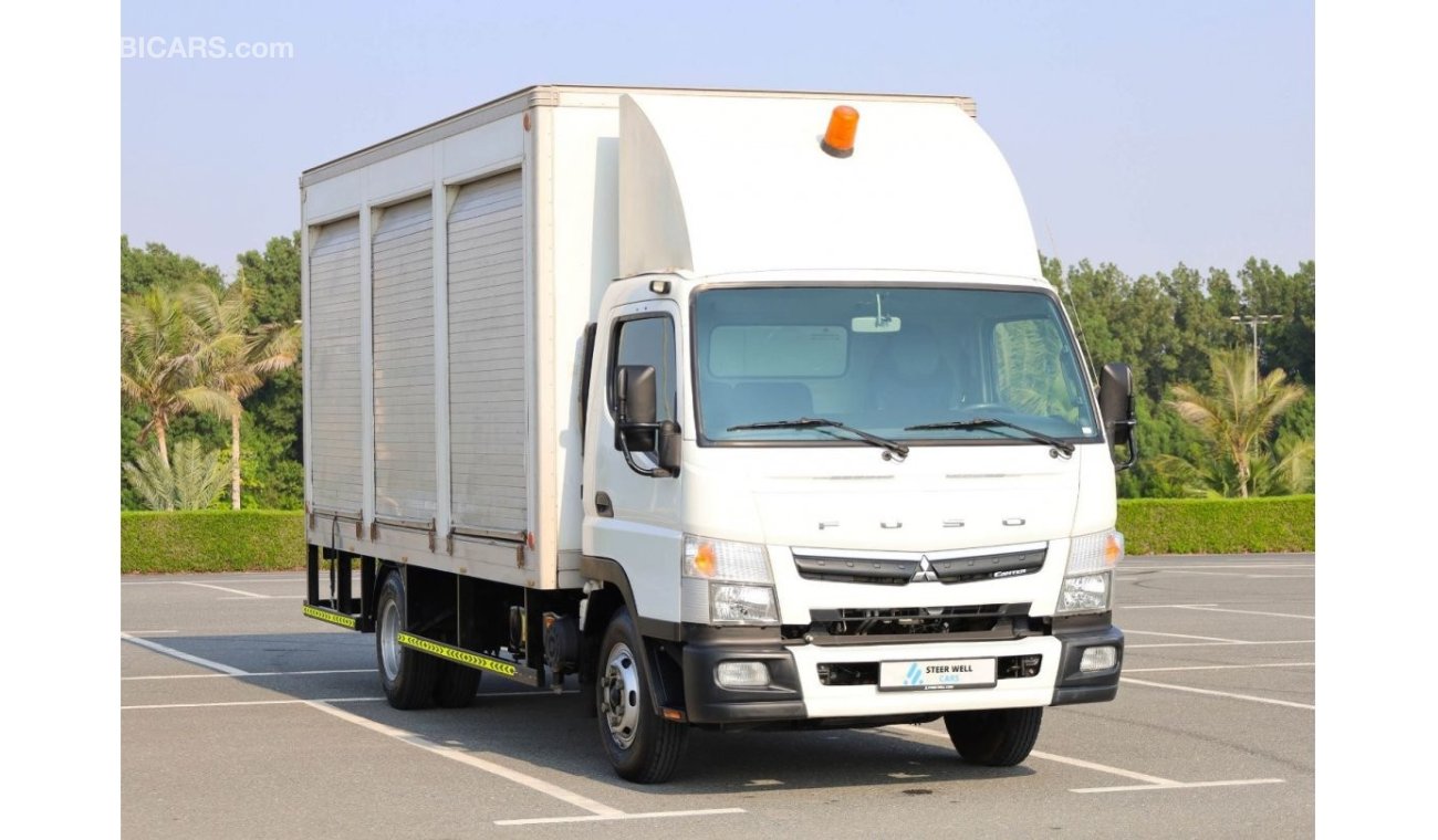 Mitsubishi Fuso Canter | Long Chassis | Shutter Box Water Body | Excellent Condition | GCC