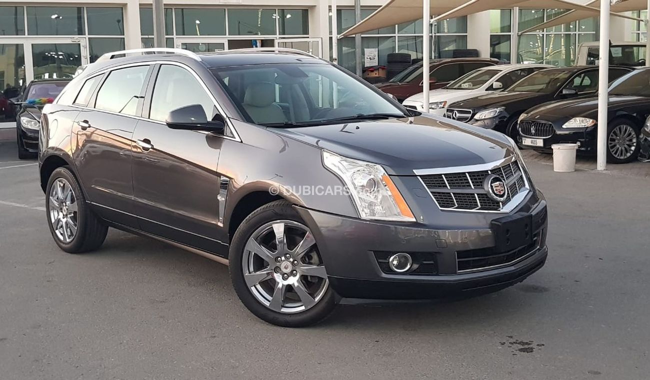 كاديلاك SRX موديل 2011 خليجي فل مواصفات كراسي جلد ومثبت سرعه وتحكم كهربي كامل ونظام صوت ممتاز وكاميرا خلفيه ومدخ