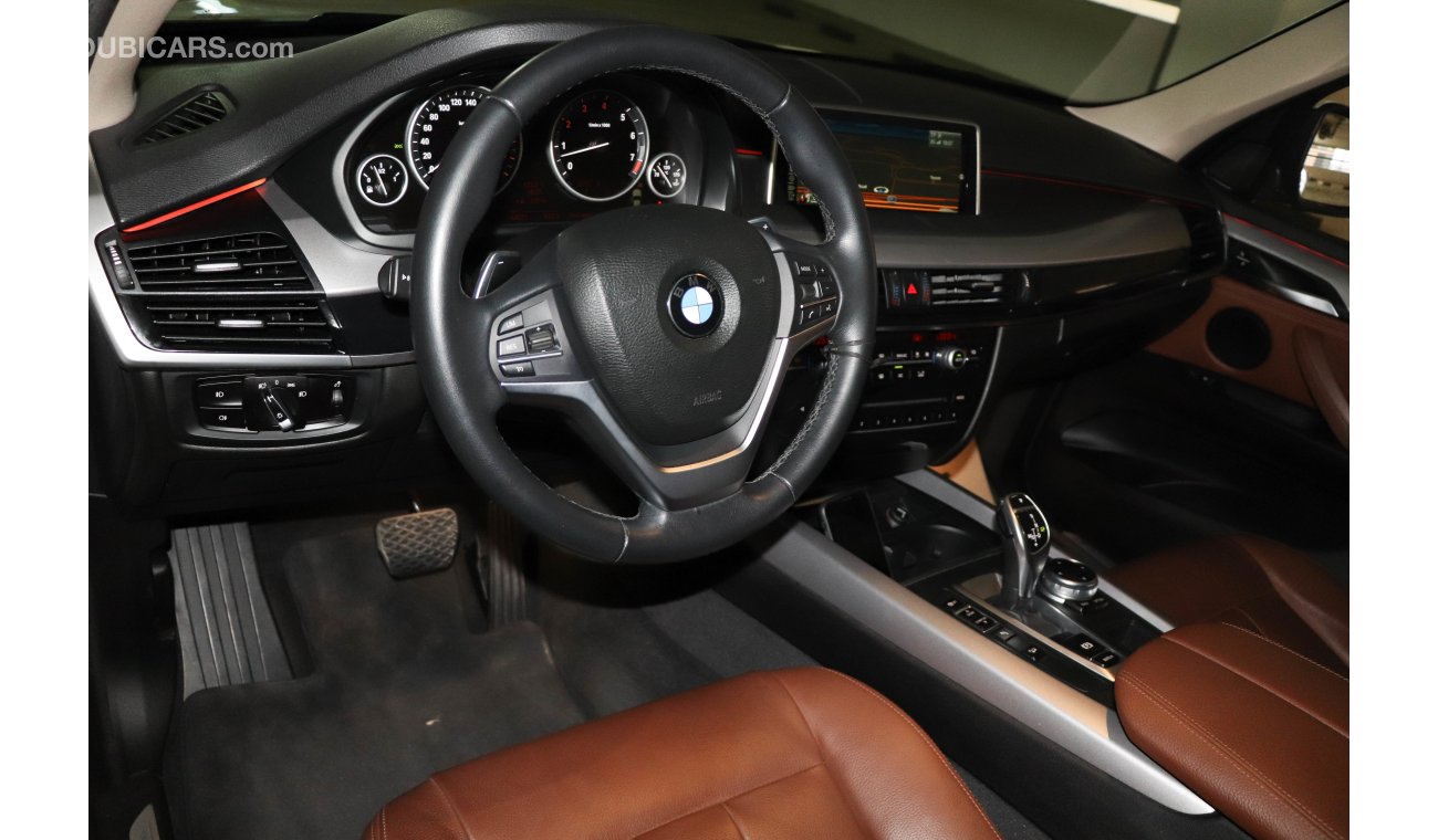 BMW X5 X-Drive 35i Executive, under warranty with zero down payment.