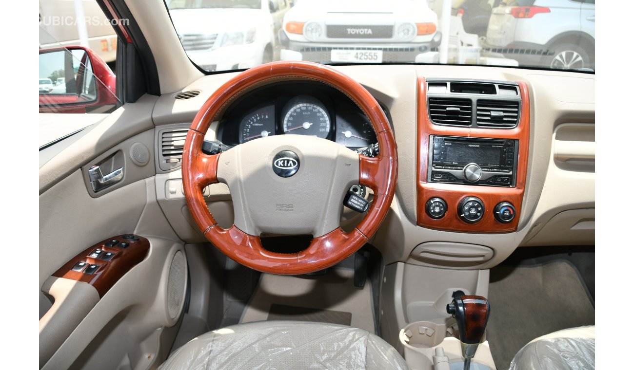 كيا سبورتيج احمر 2009 خليجى بحالة ممتازة بدون حوادث