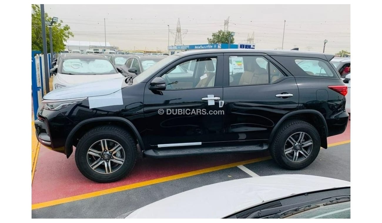 Toyota Fortuner BRAND NEW TOYOTA FORTUNER SR5 BLACK COLOR DUAL A/C BEIGE INTERRIOR WITH TANK SEATS COLOR AVILABLE IN