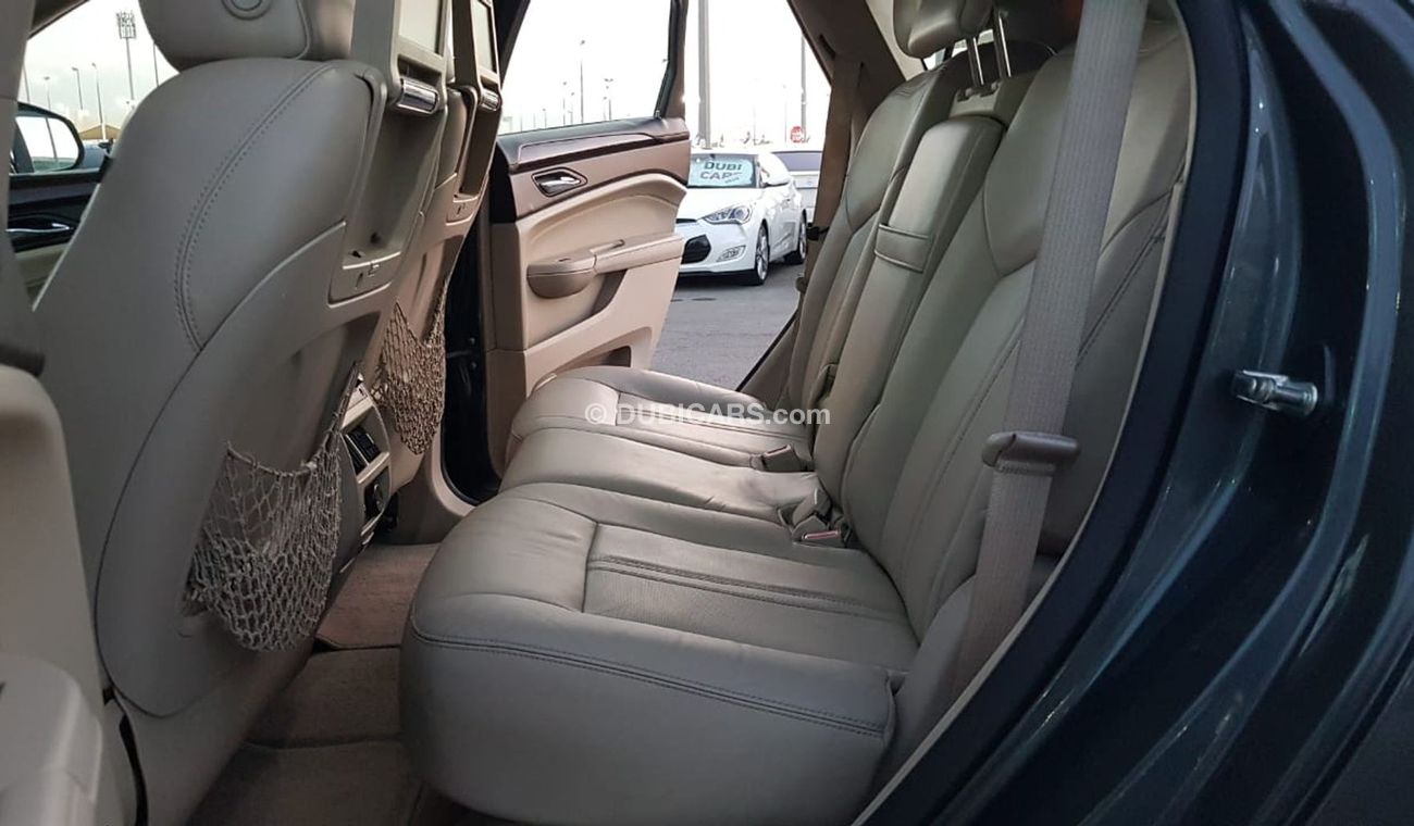 كاديلاك SRX موديل 2011 خليجي فل مواصفات كراسي جلد ومثبت سرعه وتحكم كهربي كامل ونظام صوت ممتاز وكاميرا خلفيه ومدخ