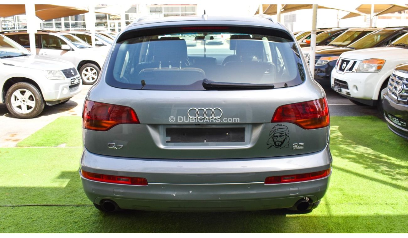 Audi Q7 2009 GCC model, silver color, saffron interior, leather panorama, cruise control, sensor wheels, in