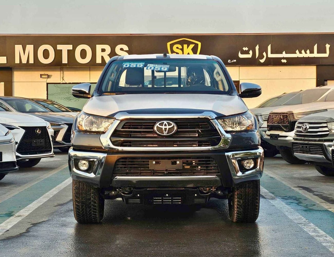 تويوتا هيلوكس WIDE BODY | M/T |  2.4L V4 DIESEL | 3 AIRBAG | COOL BOX | LARGE DVD |  UNDER PROTECTOR STRIPE TAPE B