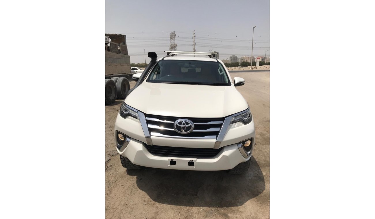 Toyota Fortuner diesel white color 2015 model full option 7 seats automatic 2.8L