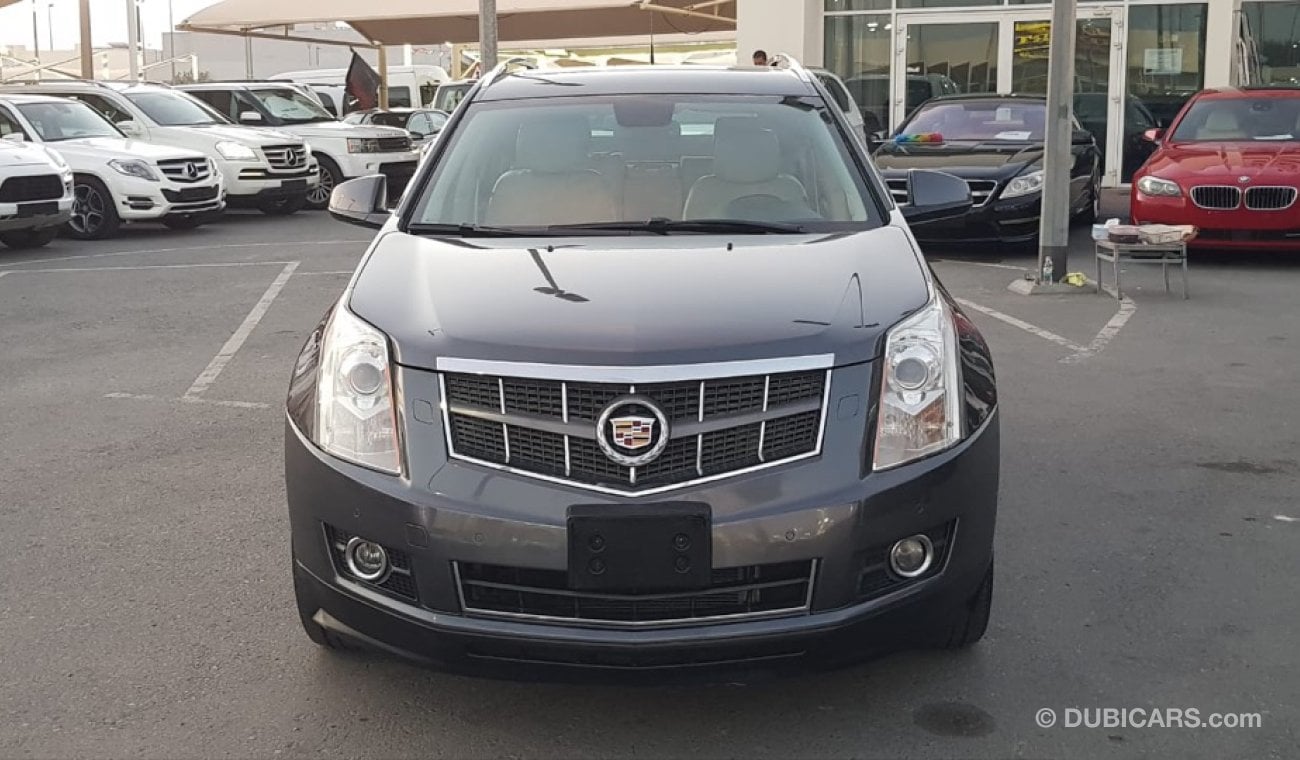 Cadillac SRX Caddillac SRX model 2011 GCC car prefect condition full option low mileage panoramic roof leather s