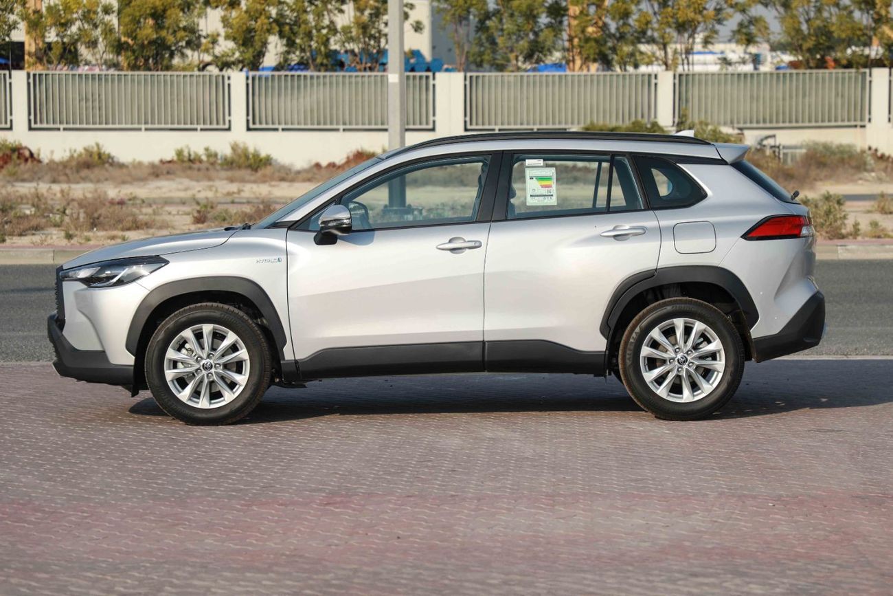 تويوتا كورولا كروس 1.8 Hybrid MID - Silver inside Red | Export Only