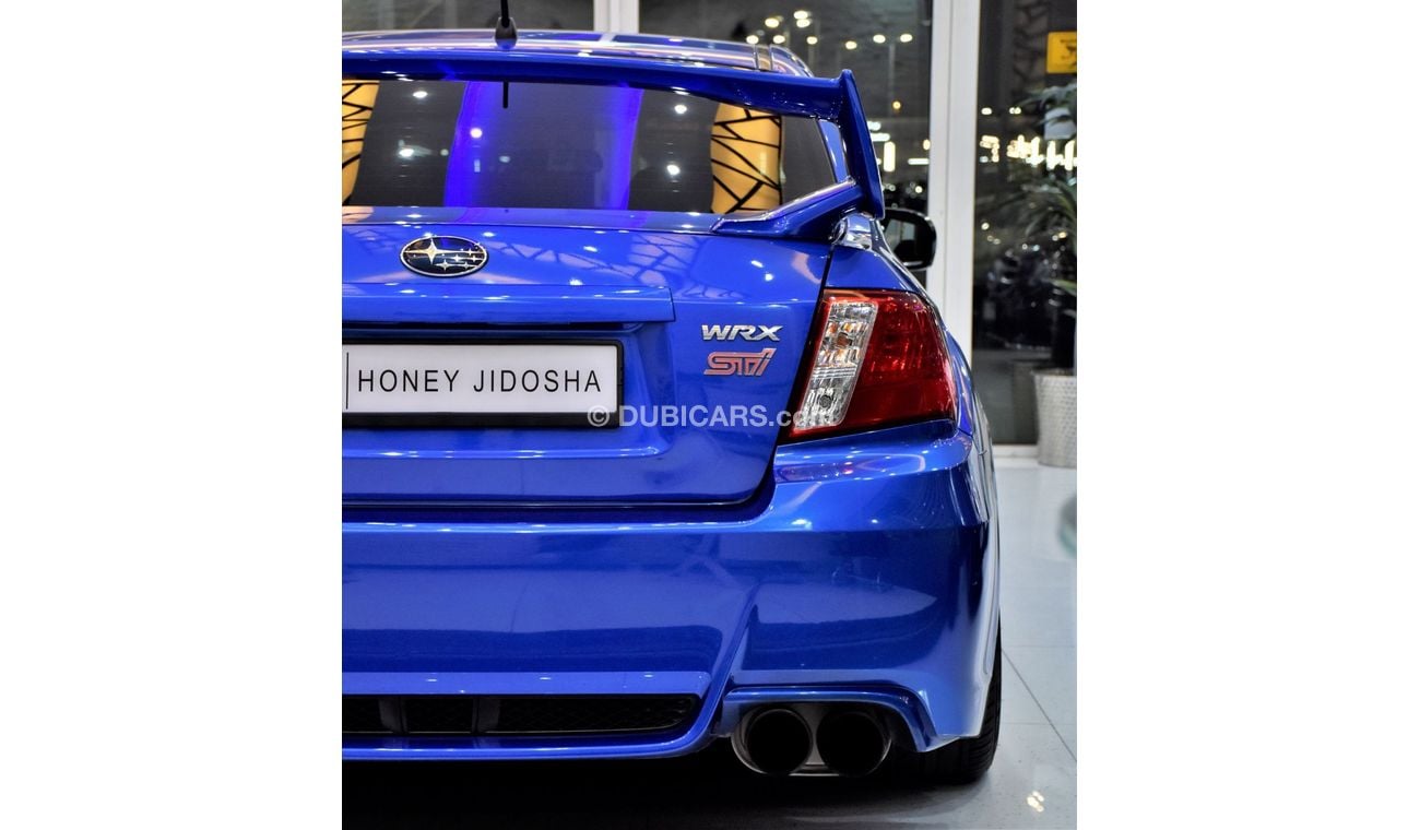 Subaru Impreza WRX EXCELLENT DEAL for our Subaru WRX STi AWD ( 2011 Model ) in Blue Color GCC Specs