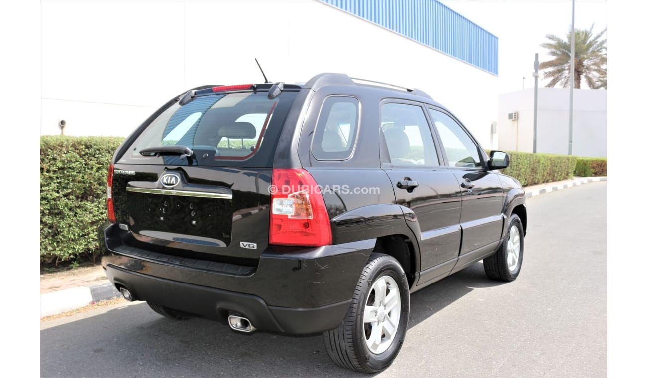 كيا سبورتيج كيا سبورتاج 2009 خليجي فل اوبشن جلد و فتحه فورويل 2700 سي سي