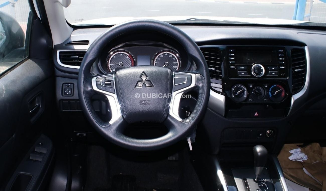 Mitsubishi L200 Mitsubishi L200 pick up DOUBLE CAB , White color ,, A/T ,, 2.4L Diesel ,, Chrome Packedg V4