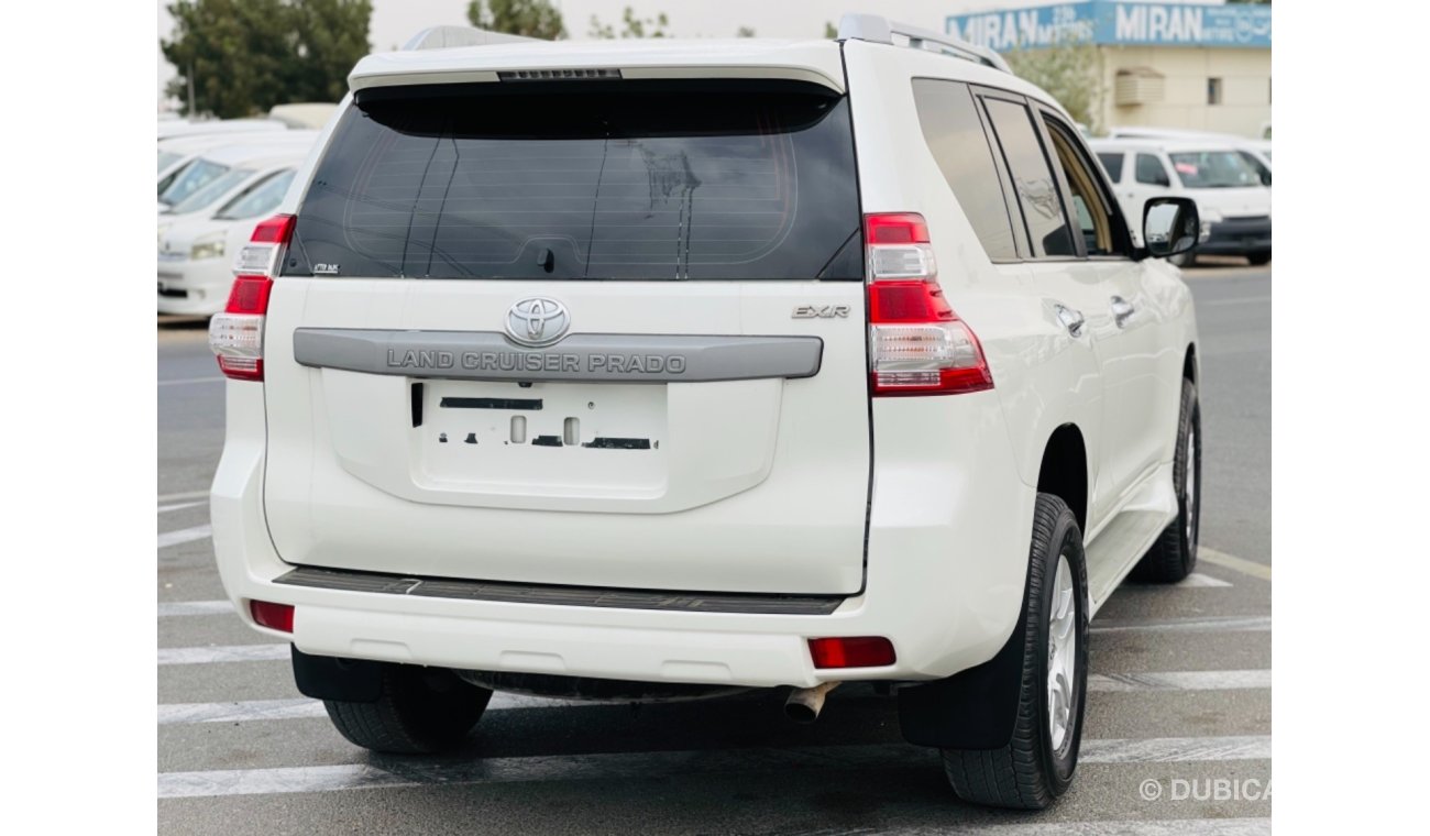 Toyota Prado Toyota prado 4 cylinder left hand drive 2014 model petrol engine 7 seater car very clean and good co