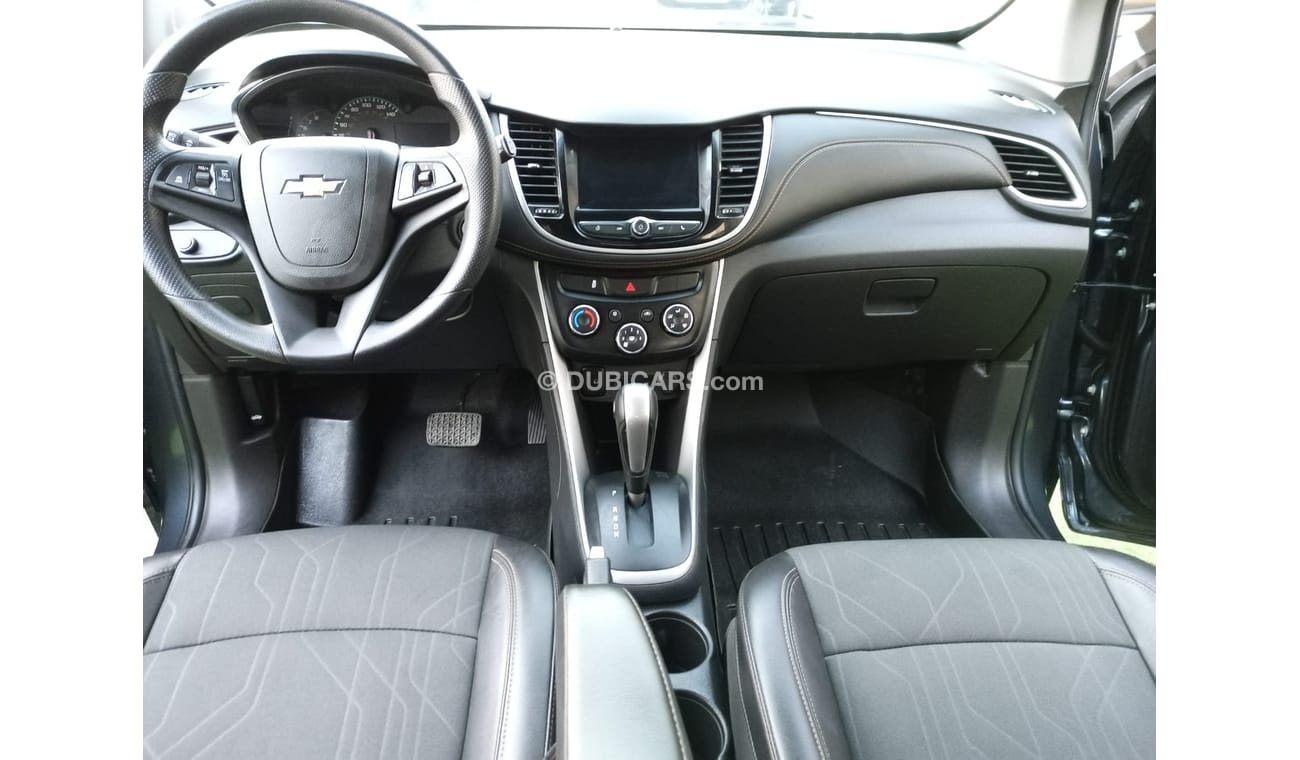 Chevrolet Trax 1400 CC 2021 model, gray color, cruise control, rear spoiler, screen, rear camera, in excellent cond