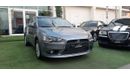 Mitsubishi Lancer Gulf gray color, inside beige without accidents, rear wing sensors, fog lights, in excellent conditi