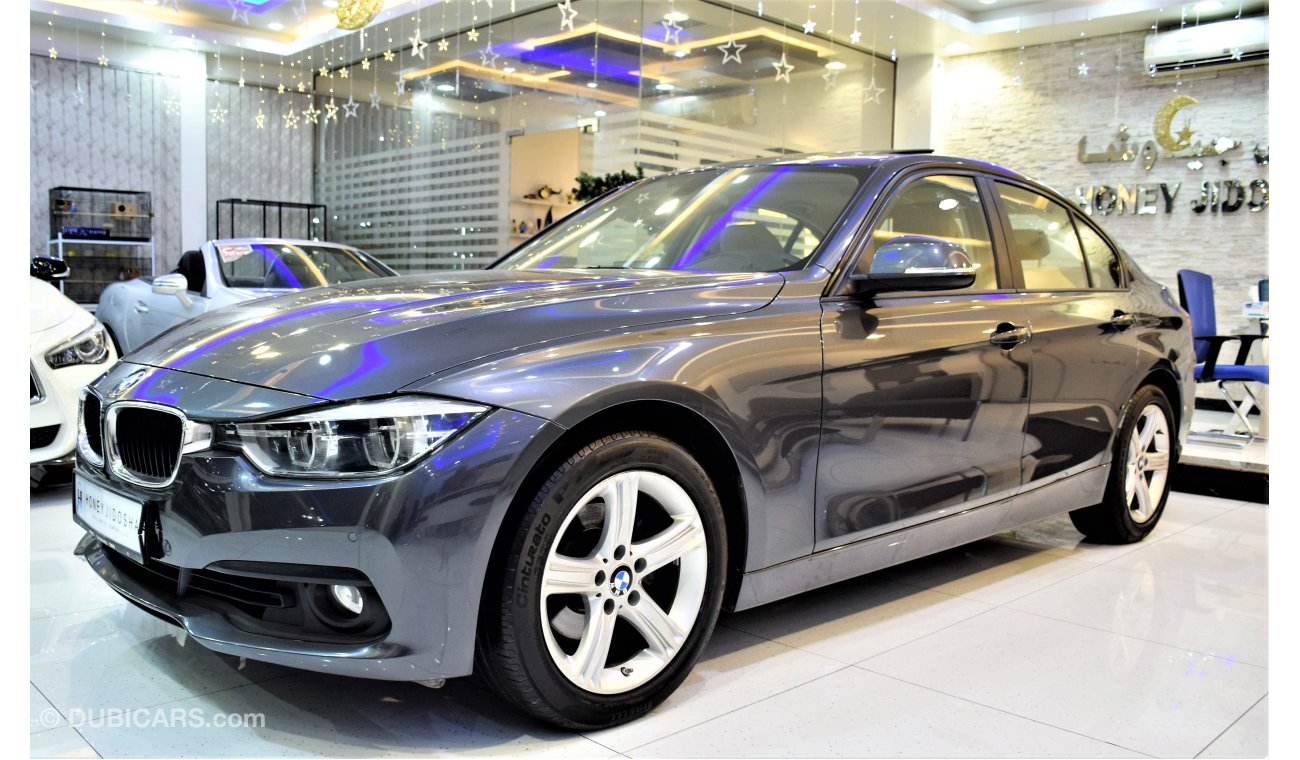 BMW 320i i 32000 KM ONLY 2016 Model in Grey color GCC SPECS