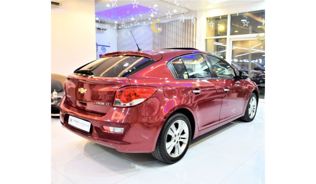 شيفروليه كروز VERY LOW MILEAGE! ONLY 85,000KM! Chevrolet Cruze LT HATCHBACK 2013 Model!! in Red Color! GCC Specs