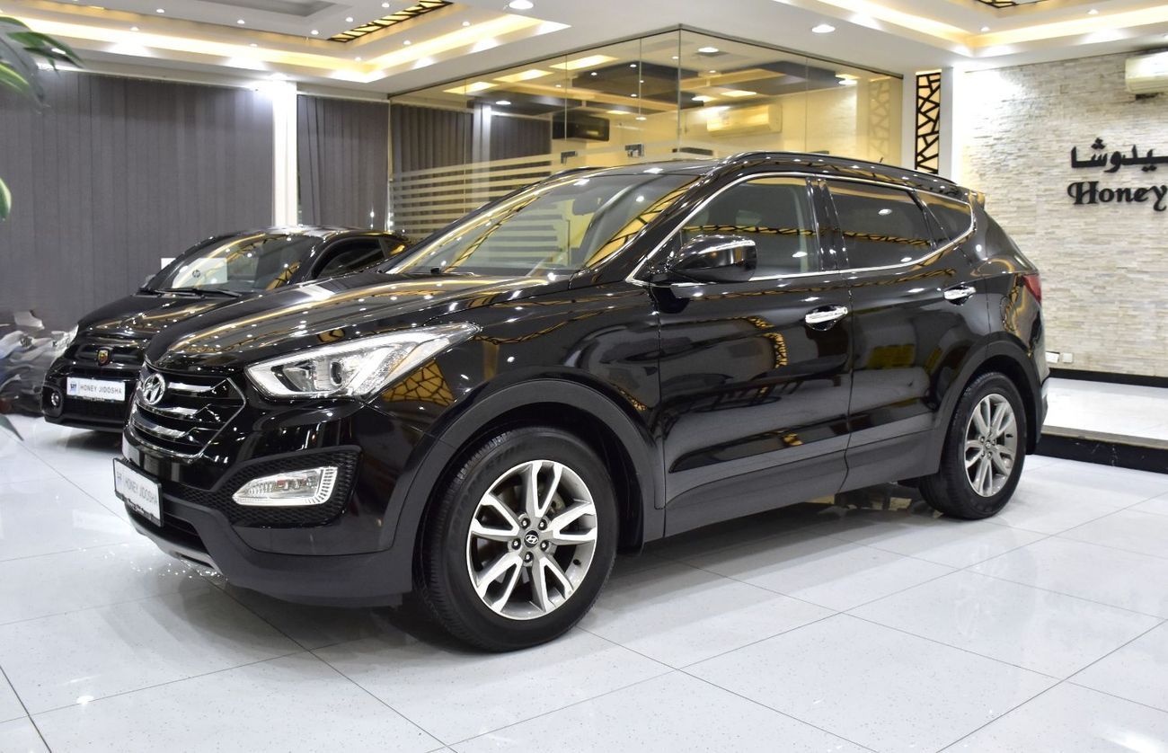 Hyundai Santa Fe EXCELLENT DEAL for our Hyundai SantaFe 4WD 3.3L ( 2014 Model ) in Black Color GCC Specs