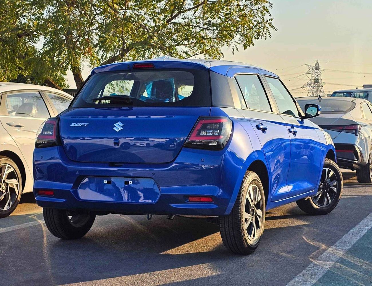 سوزوكي سويفت GLX / 1.2L PETROL V3 A/T/ PUSH START / REAR PARKING SENSOR / REAR CAMERA (CODE # SGLX) *RAMADAN OFFE