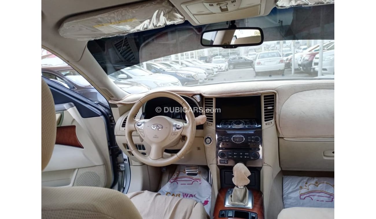 إنفينيتي FX50 موديل 2009 خليجى صبغ وكالة رقم واحد فتحة جلد مثبت حساسات رنجات مثبت كاميرا لاتحتاج الى أى مصاريف