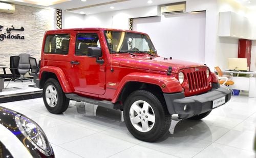 Jeep Wrangler EXCELLENT DEAL for our Jeep Wrangler Sahara ( 2014 Model ) in Red Color GCC Specs