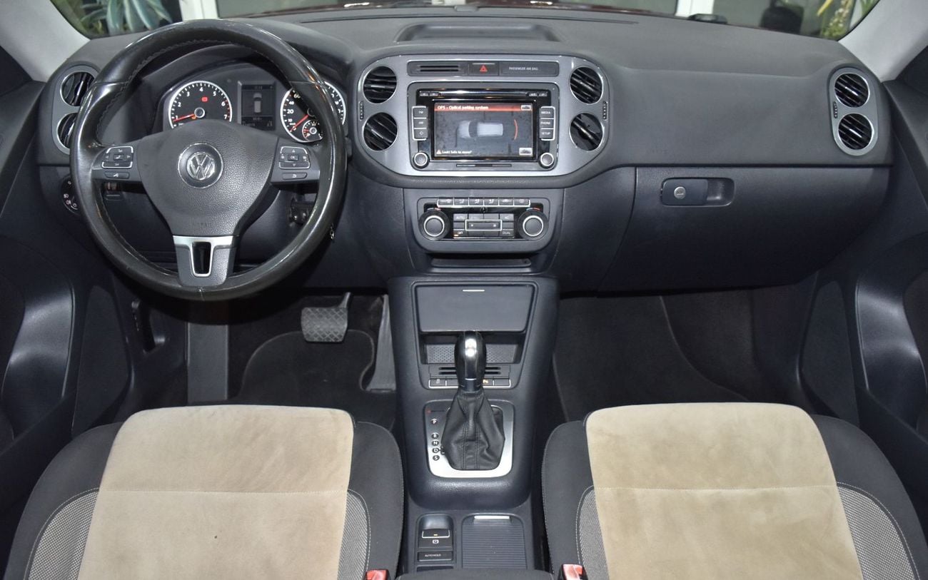 Volkswagen Tiguan SEL EXCELLENT DEAL for our Volkswagen Tiguan 2.0 TSi 4Motion ( 2014 Model ) in Red Color GCC Specs