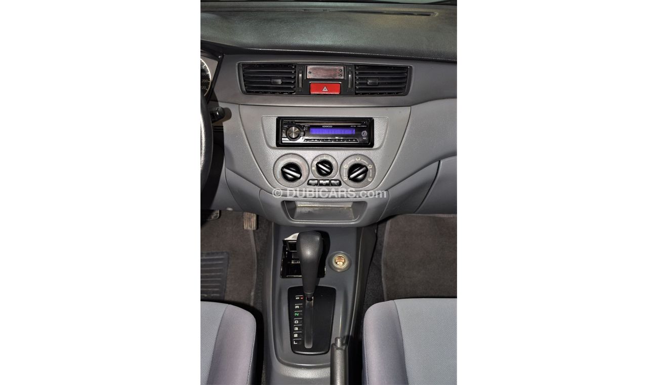 Mitsubishi Lancer EXCELLENT DEAL for our Mitsubishi Lancer 2012 Model!! in White Color! GCC Specs