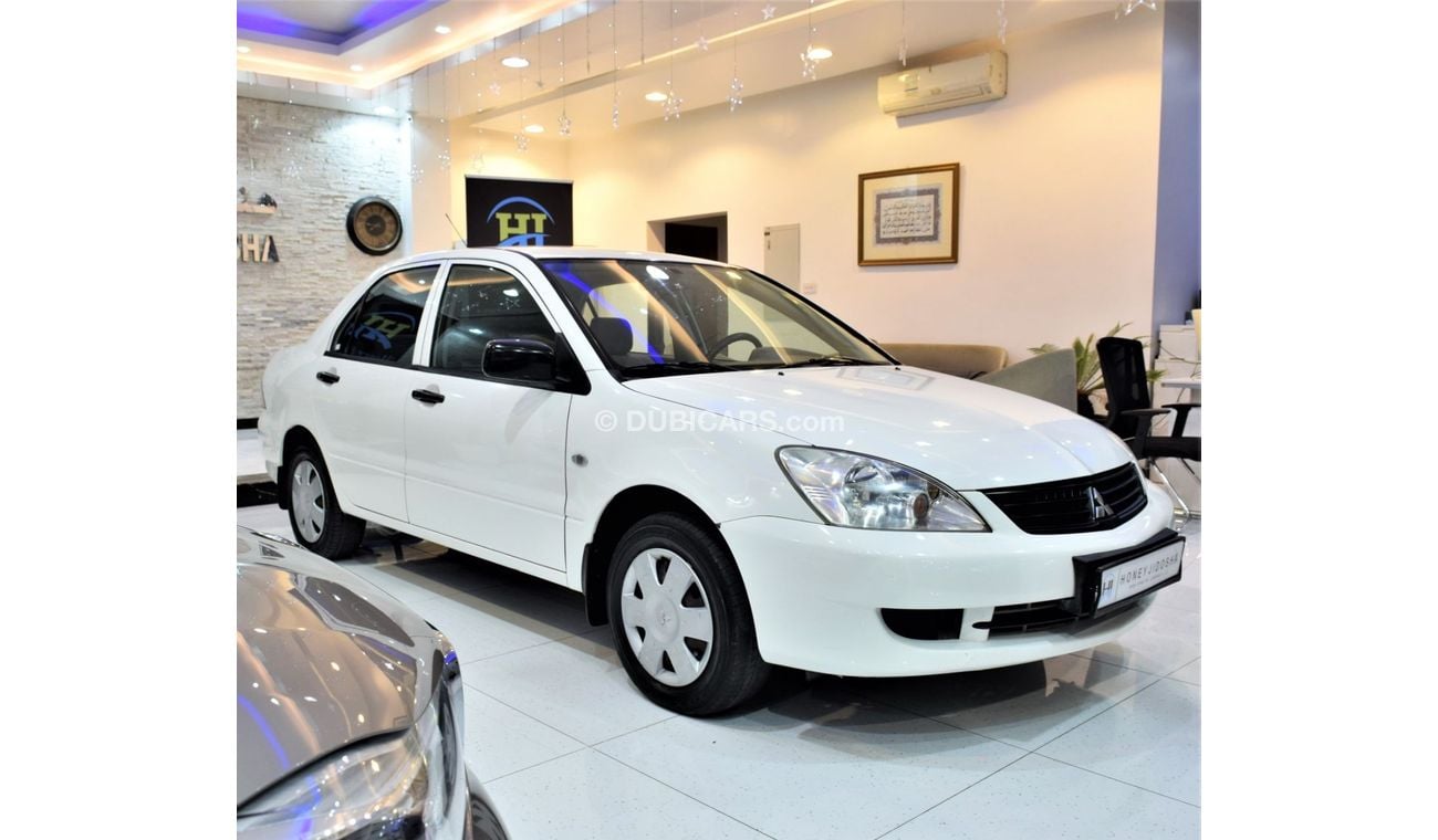 Mitsubishi Lancer EXCELLENT DEAL for our Mitsubishi Lancer 2012 Model!! in White Color! GCC Specs