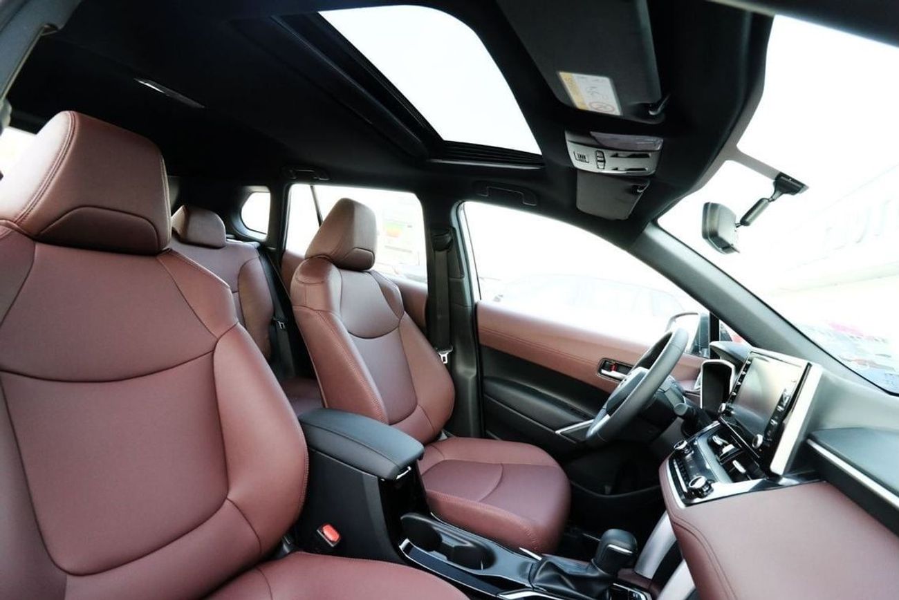 Toyota Corolla Cross Best offer for the new Corolla Cross Hybrid 2024 1.8L contact Now | Terra rosa color interior