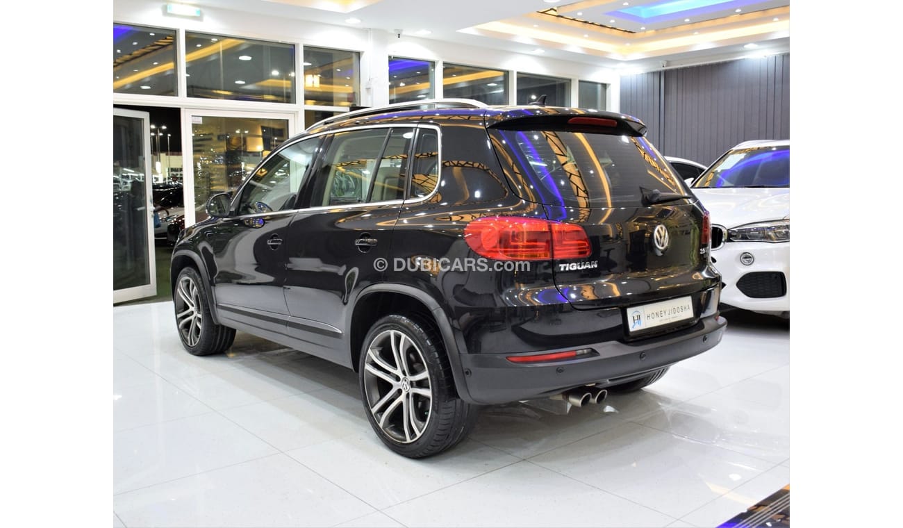 Volkswagen Tiguan SEL EXCELLENT DEAL for our Volkswagen Tiguan 2.0 TSi 4Motion ( 2014 Model! ) in Black Color! GCC Spe