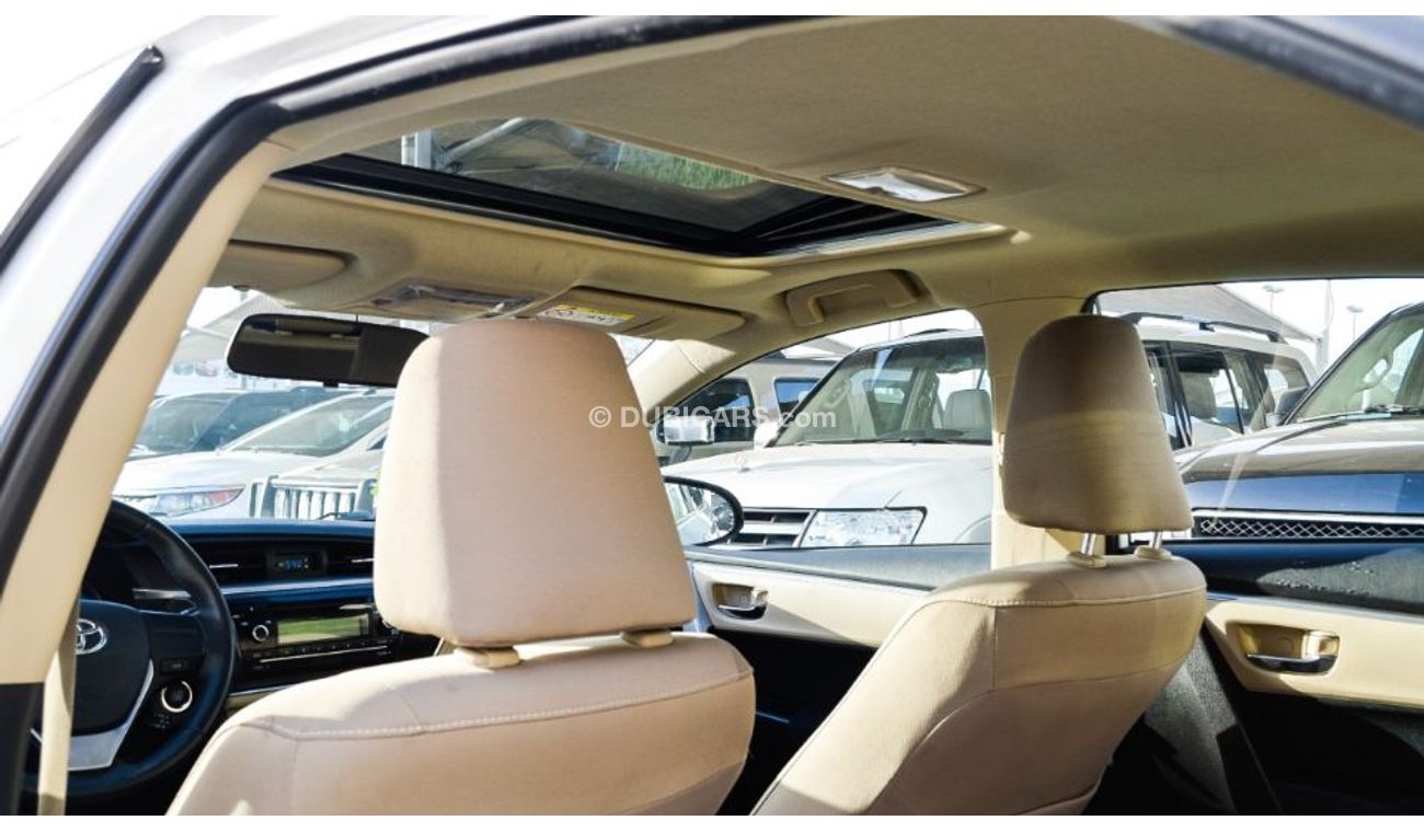 تويوتا كورولا خليجى 2015 رقم واحد فتحة بصمة كاميرا خلفية شاشة تحكم مثبت رنجات حساسات بحالة ممتازة لاتحتاج لمصاريف